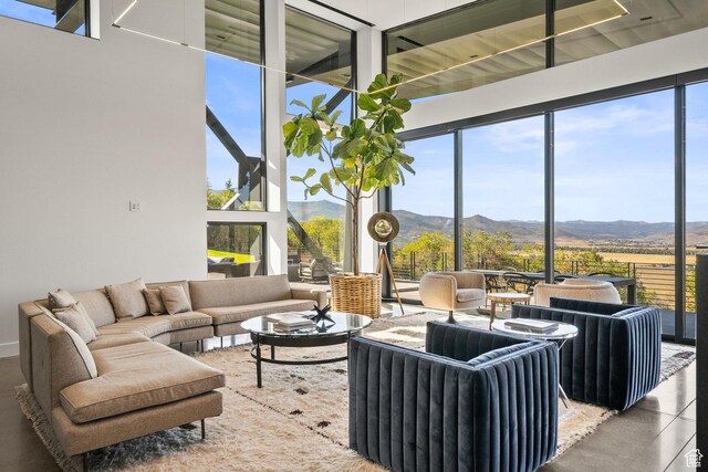27 Normans Way, Park City, UT 84060 - living room with a mountain view, healthy amount of natural light, and floor to ceiling windows