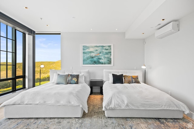 27 Normans Way, Park City, UT 84060 - bedroom featuring a wall mounted air conditioner, multiple windows, and wood finished floors