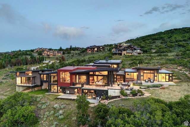 27 Normans Way, Park City, UT 84060 - rear view of house with a patio and a sunroom