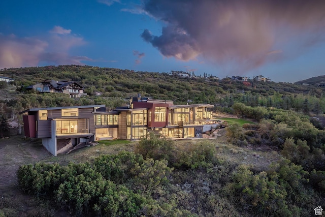 27 Normans Way, Park City, UT 84060 - back of house at dusk with a forest view