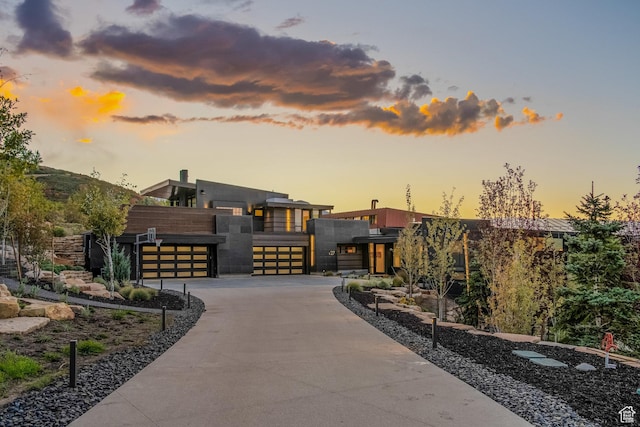 27 Normans Way, Park City, UT 84060 - modern home featuring driveway, a gate, and an attached garage