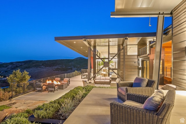 27 Normans Way, Park City, UT 84060 - view of patio featuring an outdoor living space with a fire pit and a mountain view
