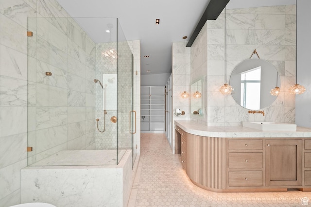 27 Normans Way, Park City, UT 84060 - bathroom with a shower stall, vanity, tile patterned flooring, tile walls, and a soaking tub