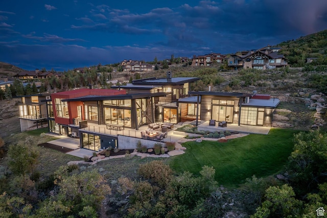 27 Normans Way, Park City, UT 84060 - rear view of house with a patio and a yard