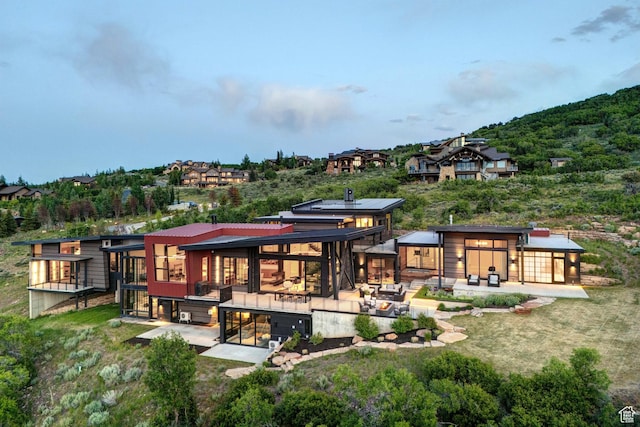 27 Normans Way, Park City, UT 84060 - back of house with a patio and a metal roof