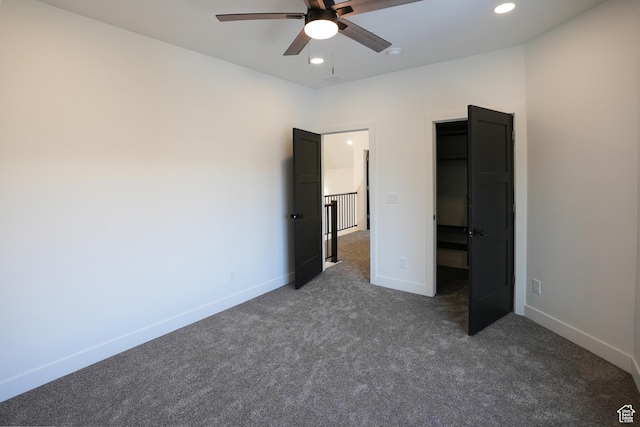 9542 Ridge Pine Rd, Heber City, UT 84032 - unfurnished bedroom featuring dark carpet and ceiling fan