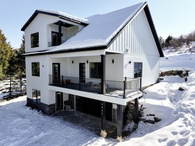 9542 Ridge Pine Rd, Heber City, UT 84032 - snow covered rear of property with a garage