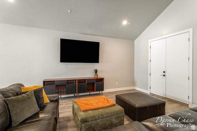 1460 S Windsor Pkwy Unit 5, Hurricane, UT 84737 - living room with baseboards, recessed lighting, wood finished floors, and lofted ceiling