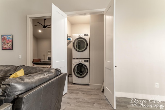 1460 S Windsor Pkwy Unit 5, Hurricane, UT 84737 - clothes washing area with stacked washer / drying machine, a ceiling fan, light wood finished floors, and laundry area