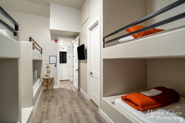 1460 S Windsor Pkwy Unit 5, Hurricane, UT 84737 - hallway with a barn door and wood finished floors