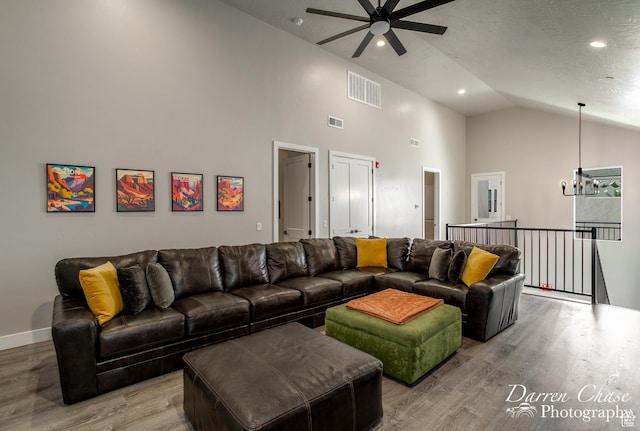 1460 S Windsor Pkwy Unit 5, Hurricane, UT 84737 - living area with light wood finished floors, visible vents, baseboards, and ceiling fan with notable chandelier