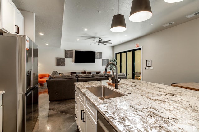 1460 S Windsor Pkwy Unit 5, Hurricane, UT 84737 - kitchen with white cabinets, recessed lighting, stainless steel fridge with ice dispenser, and a sink