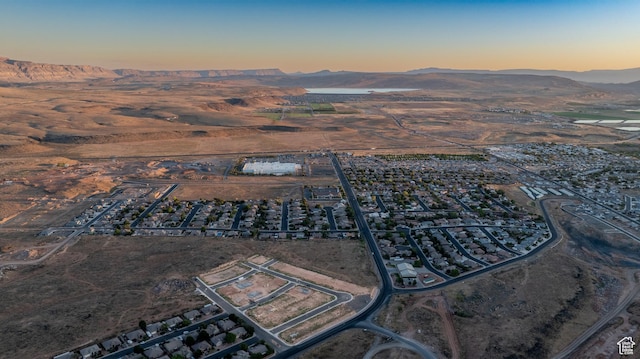 3377 W Palomar, Hurricane, UT 84737 - aerial view at dusk featuring a mountain view