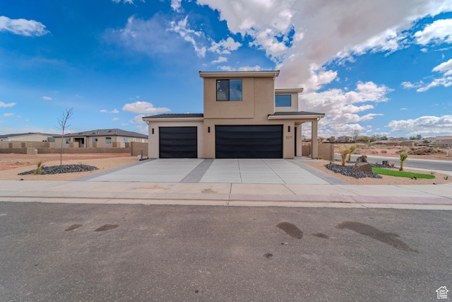 3377 W Palomar, Hurricane, UT 84737 - contemporary home with stucco siding, concrete driveway, and a garage