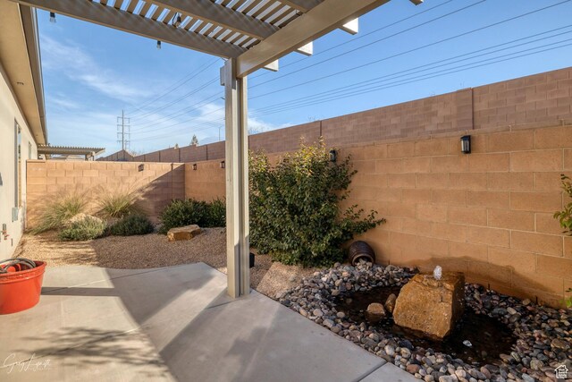 4755 S Purcell Dr, St George, UT 84790 - view of patio with a fenced backyard and a pergola