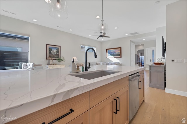 4755 S Purcell Dr, St George, UT 84790 - kitchen featuring visible vents, light stone countertops, a sink, and dishwasher