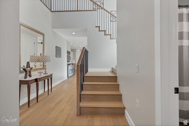 4755 S Purcell Dr, St George, UT 84790 - stairs with baseboards, a high ceiling, wood finished floors, and recessed lighting