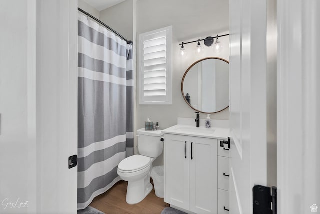 4755 S Purcell Dr, St George, UT 84790 - bathroom with toilet, vanity, a shower with shower curtain, and wood finished floors