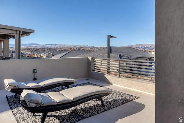 4755 S Purcell Dr, St George, UT 84790 - view of patio featuring a balcony and a mountain view