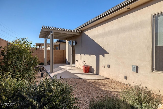 4755 S Purcell Dr, St George, UT 84790 - exterior space featuring fence, a pergola, and a patio area