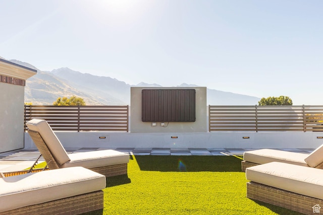 exterior space featuring an outdoor living space and a mountain view