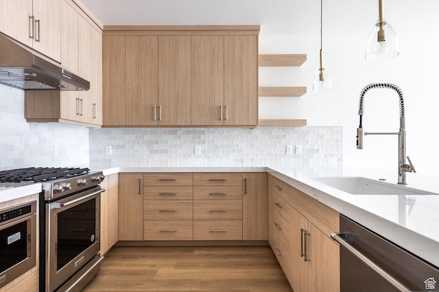 kitchen with under cabinet range hood, open shelves, appliances with stainless steel finishes, and light brown cabinetry