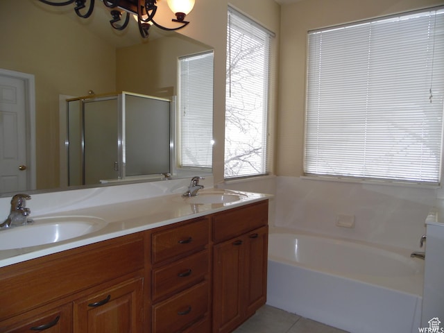 14028 S Candy Pull Dr, Draper, UT 84020 - bathroom with a bath, a sink, tile patterned flooring, and a shower stall