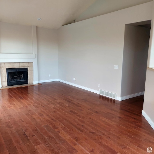 14028 S Candy Pull Dr, Draper, UT 84020 - unfurnished living room featuring baseboards, visible vents, and dark wood finished floors