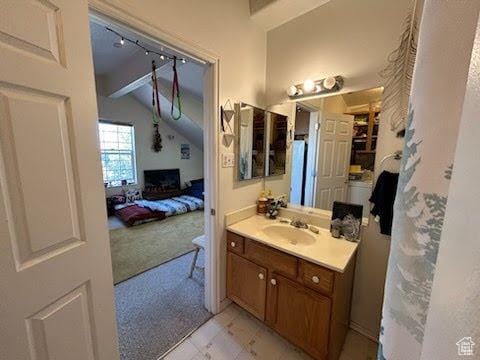 14028 S Candy Pull Dr, Draper, UT 84020 - bathroom featuring vaulted ceiling with beams and vanity