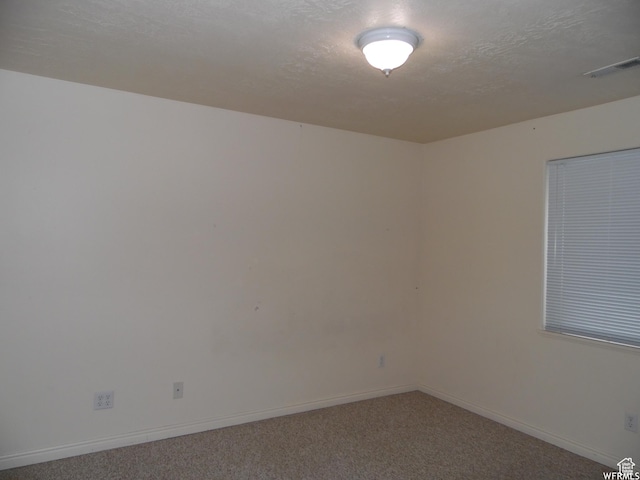 14028 S Candy Pull Dr, Draper, UT 84020 - empty room featuring baseboards, visible vents, carpet, and a textured ceiling