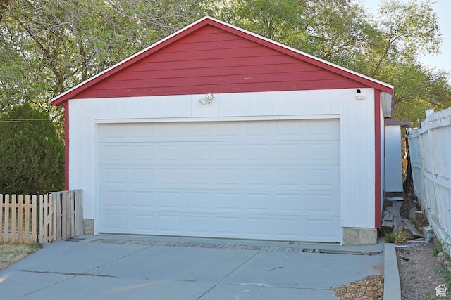 detached garage with fence