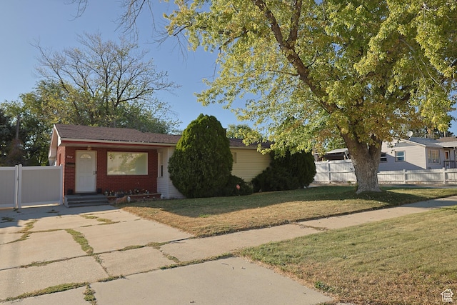 view of front of house featuring brick siding
