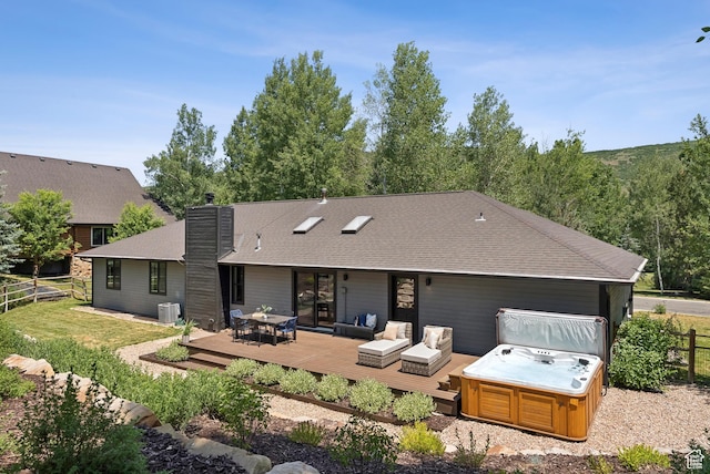 3041 Homestead Rd, Park City, UT 84098 - rear view of house with a hot tub, a wooden deck, a chimney, an outdoor hangout area, and roof with shingles