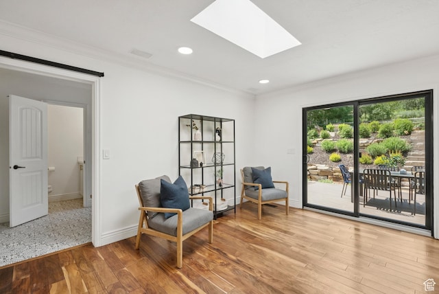 3041 Homestead Rd, Park City, UT 84098 - living area with ornamental molding, wood finished floors, a skylight, and recessed lighting