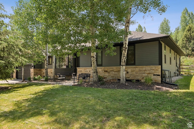 3041 Homestead Rd, Park City, UT 84098 - view of front of house with stone siding and a front lawn