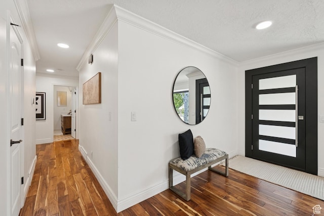 3041 Homestead Rd, Park City, UT 84098 - entryway with ornamental molding, wood finished floors, recessed lighting, and a textured ceiling