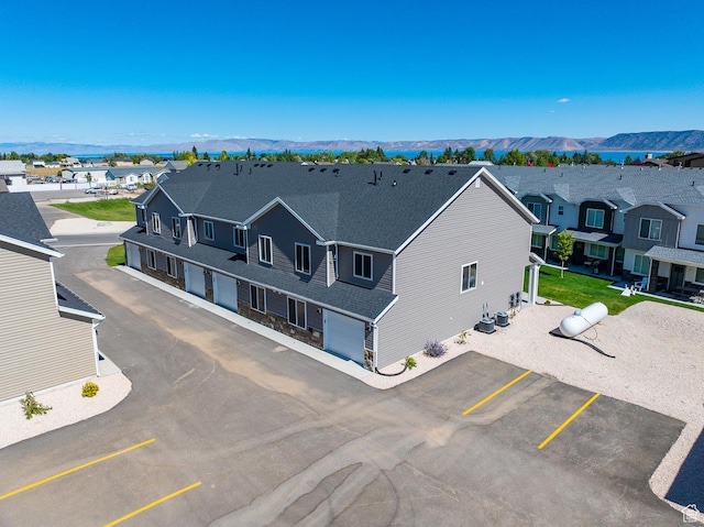 184 W Seasons Ln Unit 56, Garden City, UT 84028 - birds eye view of property with a residential view and a mountain view