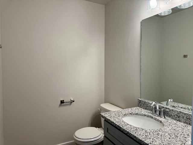 184 W Seasons Ln Unit 56, Garden City, UT 84028 - bathroom with baseboards, toilet, and vanity