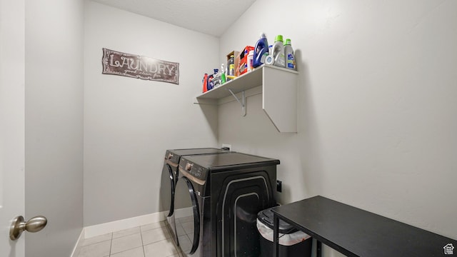 209 N Elk Ridge Dr, Elk Ridge, UT 84651 - washroom featuring washer and dryer, light tile patterned floors, baseboards, and a textured ceiling