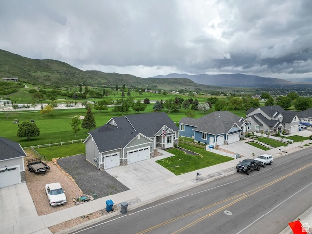 209 N Elk Ridge Dr, Elk Ridge, UT 84651 - aerial view of residential area with a mountainous background