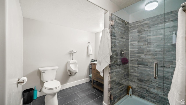 209 N Elk Ridge Dr, Elk Ridge, UT 84651 - full bathroom with tile patterned floors, a stall shower, toilet, baseboards, and vanity
