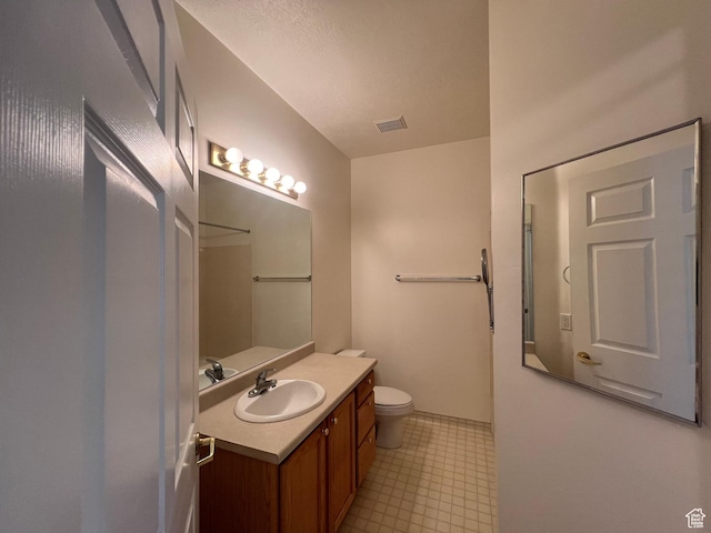 502 S 1040 E Unit 221, American Fork, UT 84003 - full bathroom featuring toilet, tile patterned floors, vanity, and visible vents
