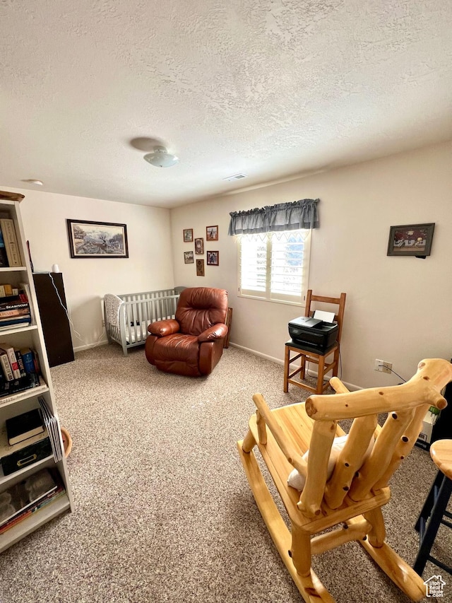 1942 N Sevier Valley Canal Rd, Richfield, UT 84701 - carpeted living area featuring visible vents, a textured ceiling, and baseboards
