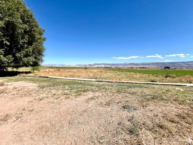 1942 N Sevier Valley Canal Rd, Richfield, UT 84701 - view of yard with a rural view and a mountain view
