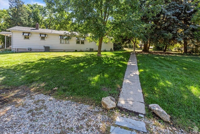 965 E 39th St S, South Ogden, UT 84403 - view of grassy yard featuring central AC unit