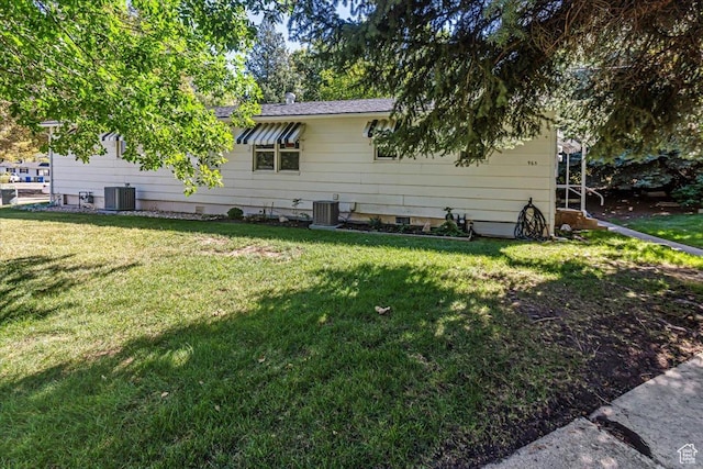 965 E 39th St S, South Ogden, UT 84403 - view of property exterior with cooling unit and a lawn