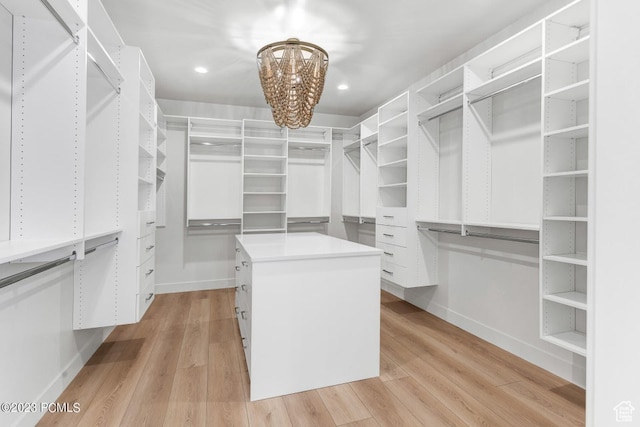 937 Hart Loop, Kamas, UT 84036 - walk in closet featuring a chandelier and light hardwood / wood-style floors