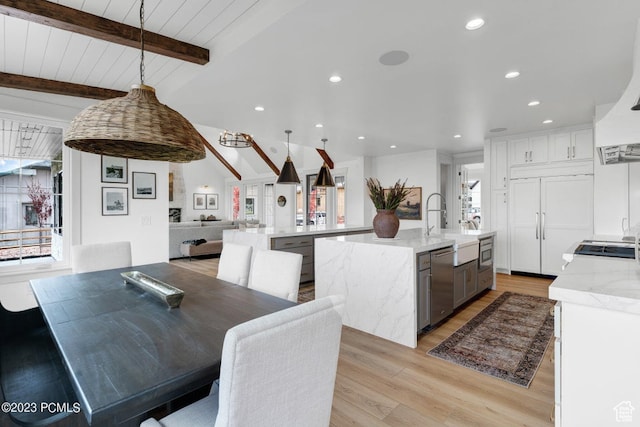 937 Hart Loop, Kamas, UT 84036 - dining room featuring lofted ceiling with beams, light hardwood / wood-style flooring, and a wealth of natural light