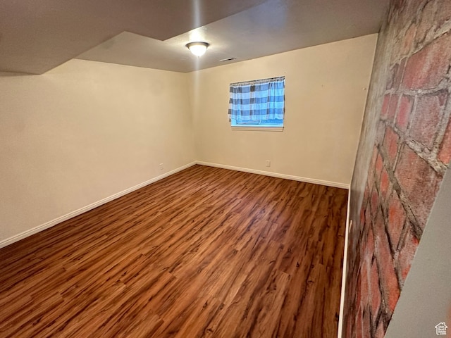 1988 E Gregson Ave, Millcreek, UT 84106 - spare room with wood finished floors and baseboards