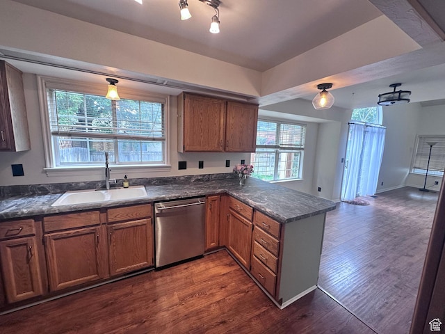 1988 E Gregson Ave, Millcreek, UT 84106 - kitchen featuring dishwasher, a sink, a peninsula, and healthy amount of natural light